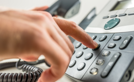 someone making a call using a voip telephone system