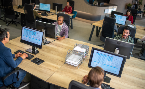 office workers on their computers researching how Vantage IT provides Buckinghamshire based businesses with complete IT solutions.