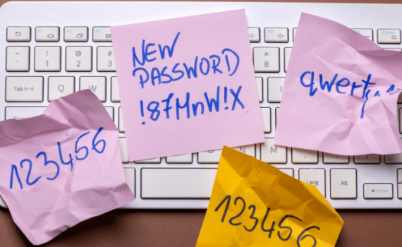 A keyboard covered with bad passwords showing someone who has not used 5 password tips to keep their SME safe.
