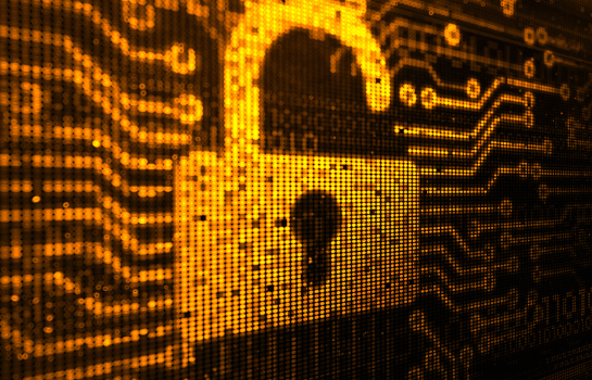 A laptop with a padlock symbol on the screen showing how IT Security protects SMEs from online threats