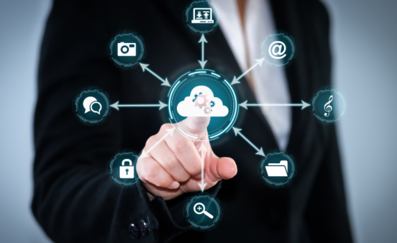 A person dressed in a suit using lots of different cloud services in his SME