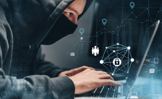 A man in a hoodie trying to hack into an SME with graphics showing how interconnected the internet is with connections between people, emails, mobile phones, and laptops and how a security system prevents him from hacking into the SME.