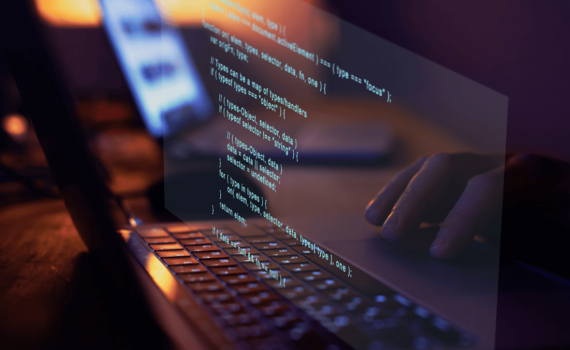 A computer showing the code of a penetration software