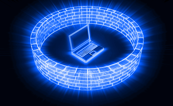 A computer surrounded by a wall acting as a firewall virus protection