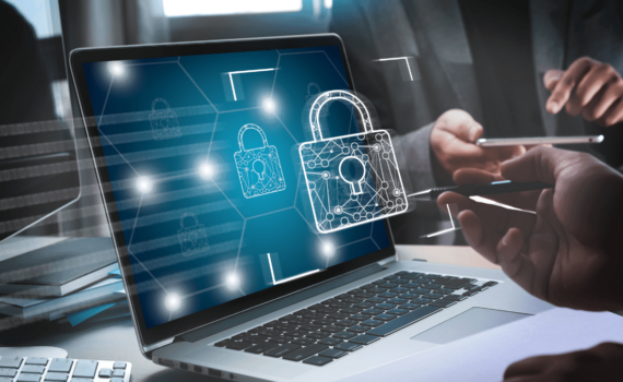 A computer showing a padlock shows cyber security's importance.